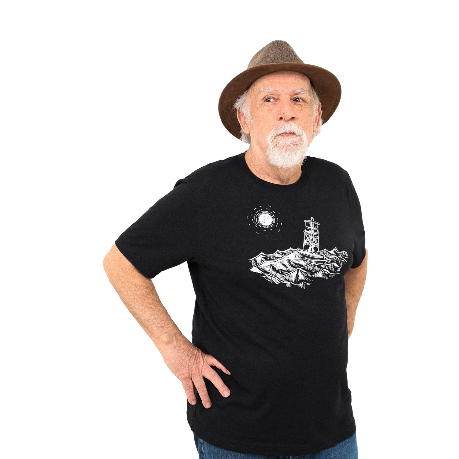 Man wearing black t-shirt with white ink of stormy seas and a rocking channel marker and a moon/sun in the distance.