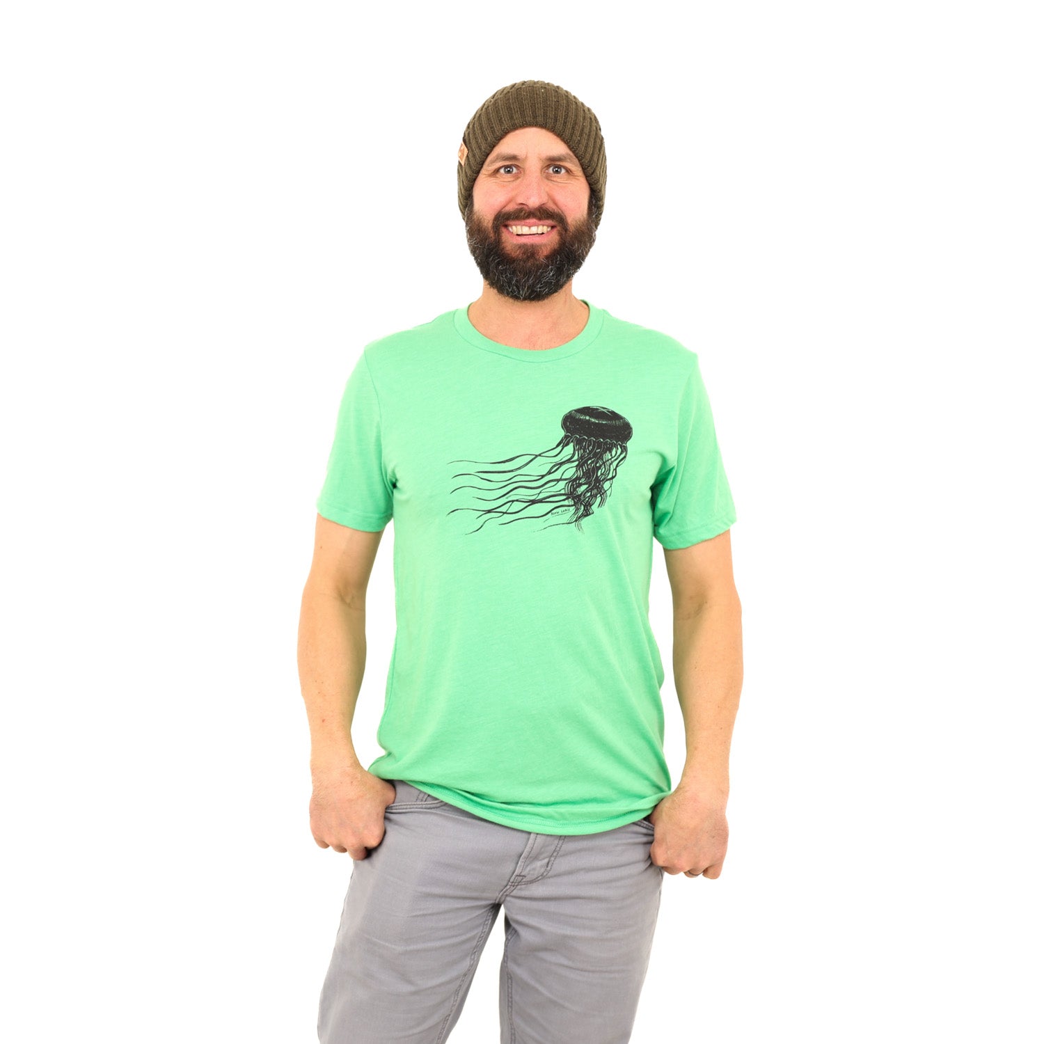 Analyzing image 12Feb2024-140 1500 × 1500px Man with beard and beanie wearing a bright green t-shirt with a black jellyfish print across the chest