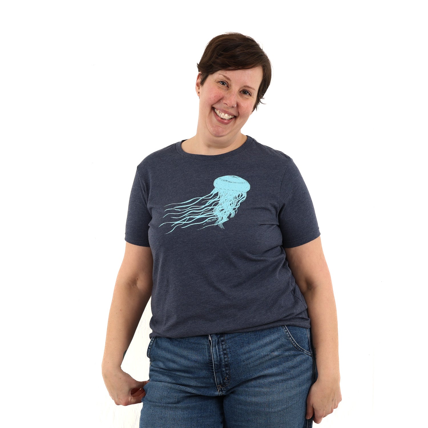 woman wearing blue t shirt with light blue jellyfish print.