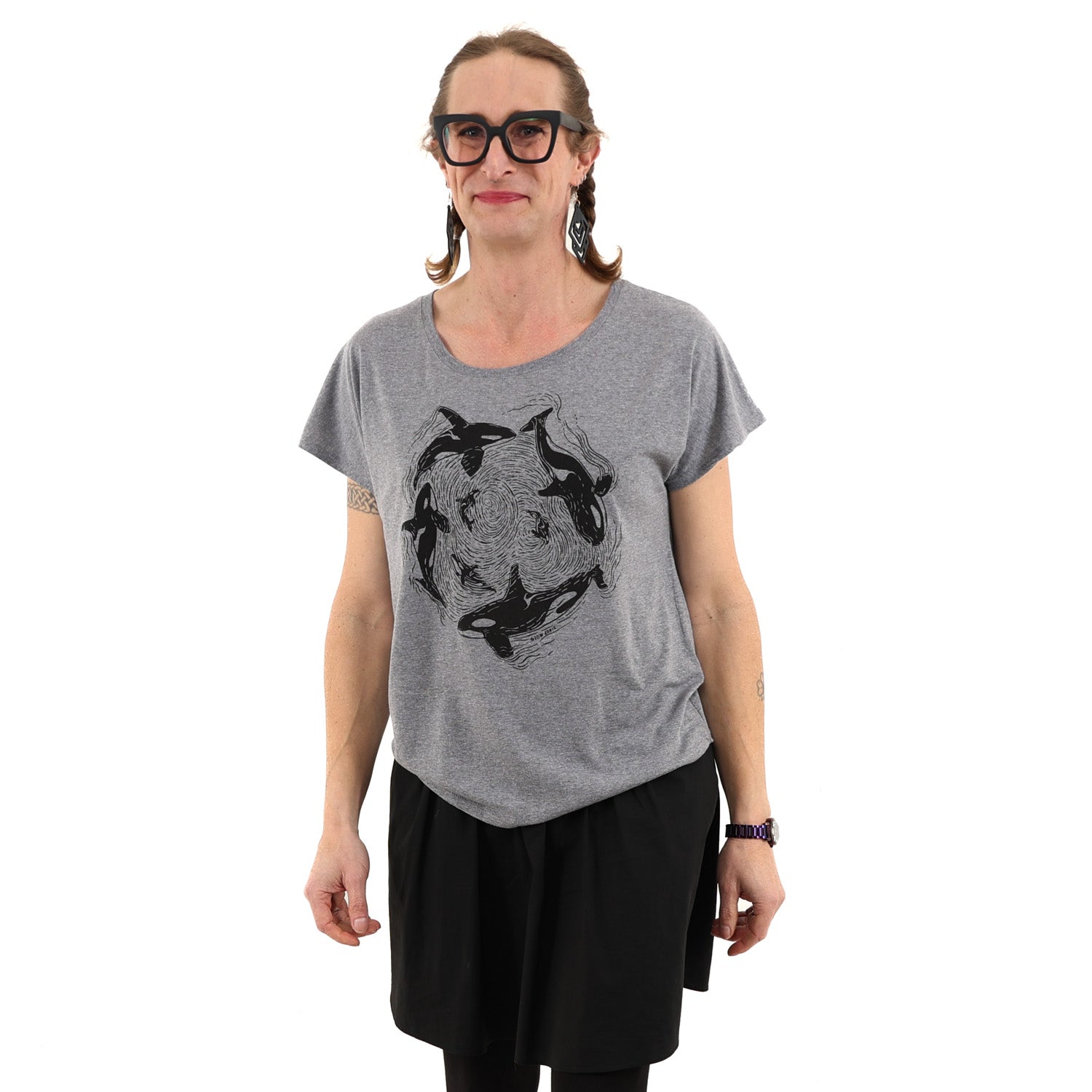 Woman wearing relax fit grey t shirt with orca whales printed in black ink