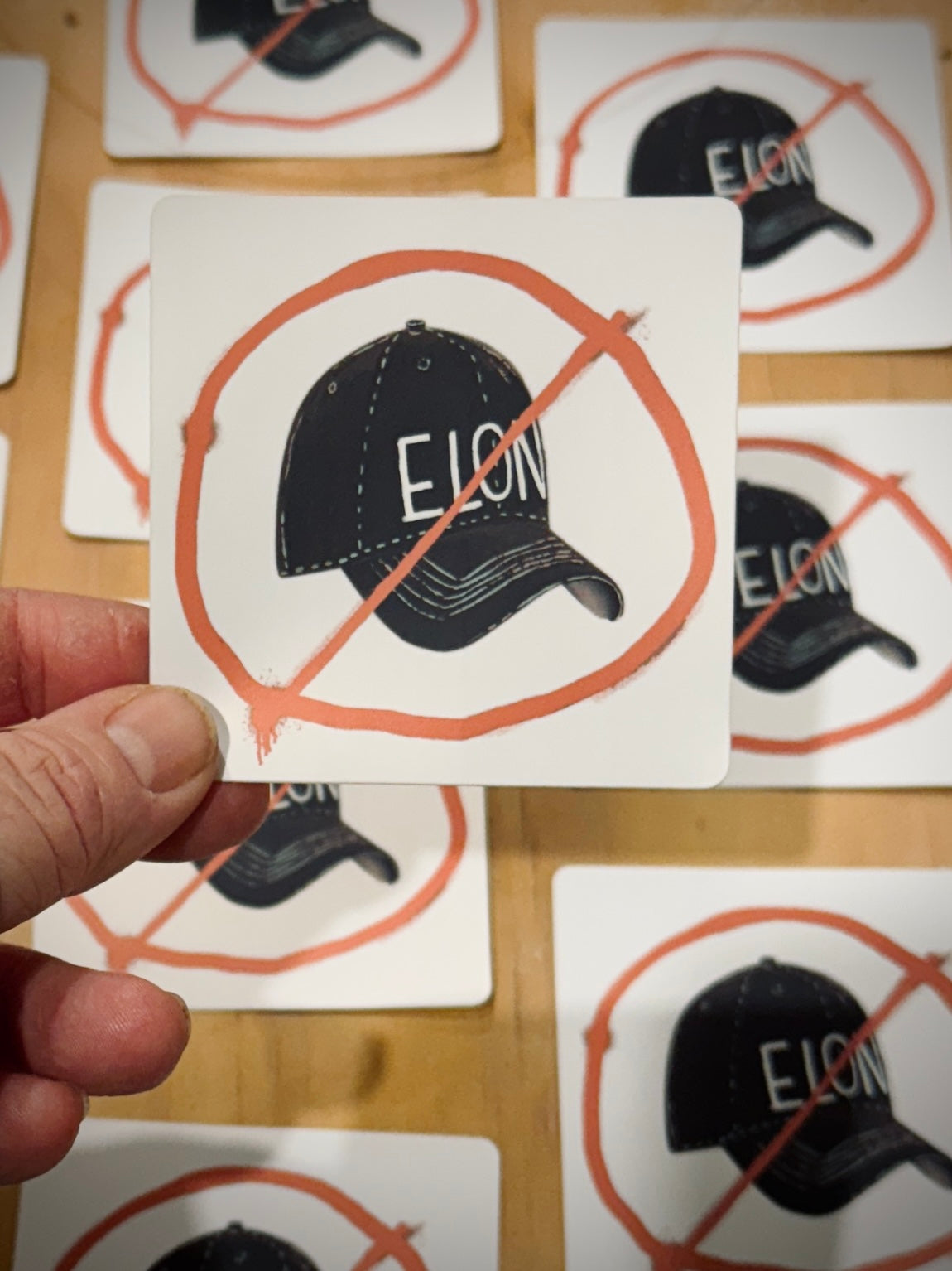 Anti-Elon Musk sticker, anti-billionaire decal, anti-tech oligarch sticker, anti-corporate greed sticker, Elon Musk criticism sticker, Parody Elon Musk sticker, dystopian tech sticker, cyberpunk resistance decal, fascist billionaire satire sticker, anti-Elon meme sticker, black maga hat, maga Elon hat, Elon Musk is a fascist sticker, anti-authoritarian tech sticker, resist billionaire control decal, no billionaires no fascism sticker, stop tech overlords sticker, anti-censorship sticker, laptop sticker, pro