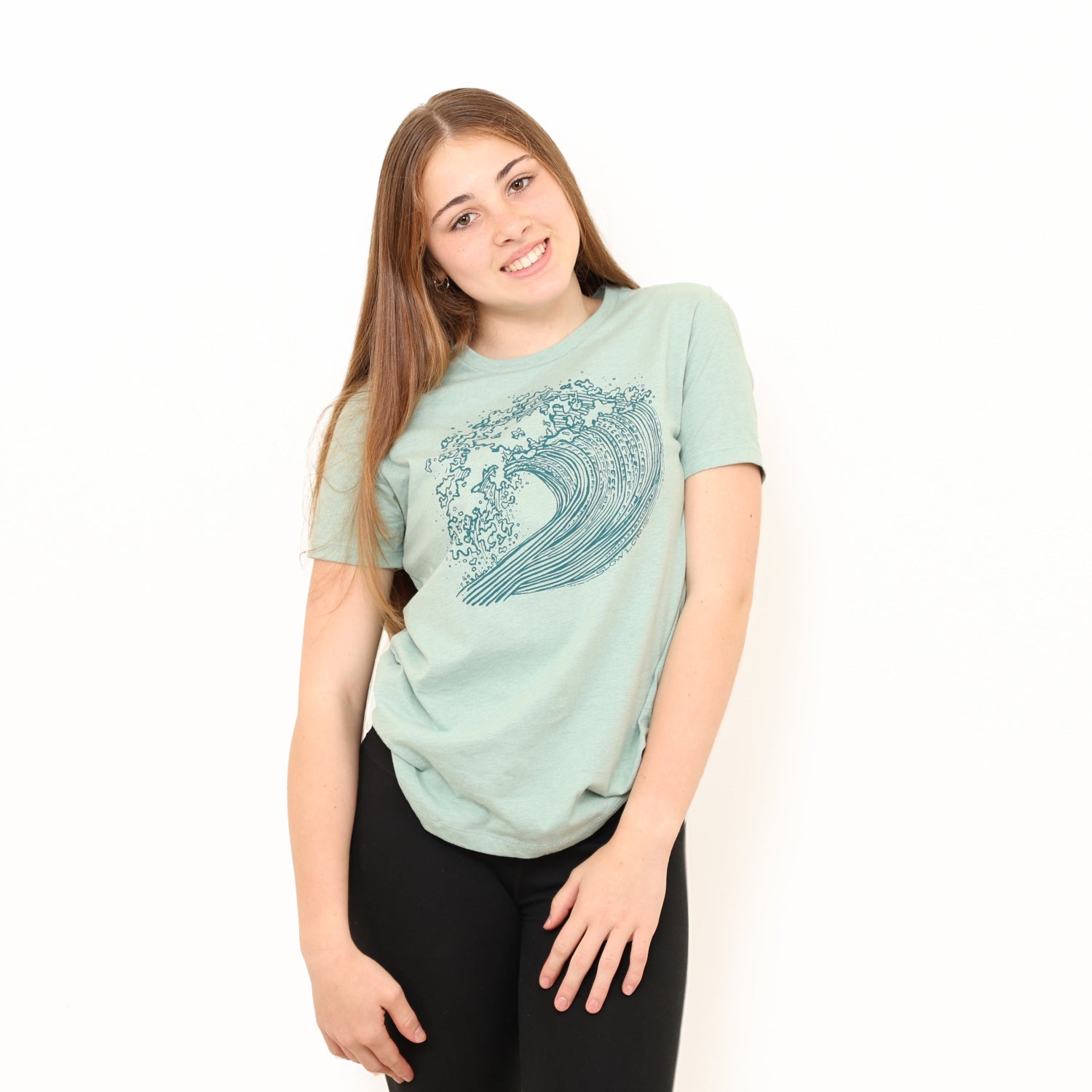 girl wearing Nalu wave shirt