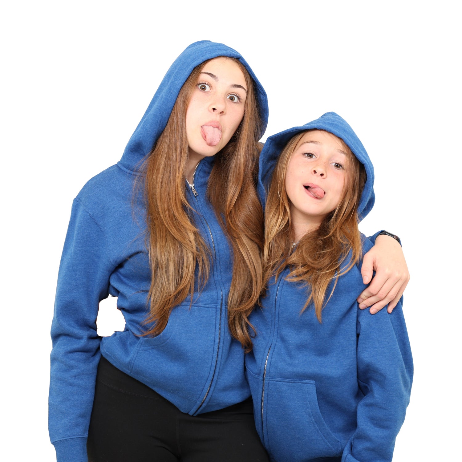two kids sticking their tongues out while wearing blue hoodies