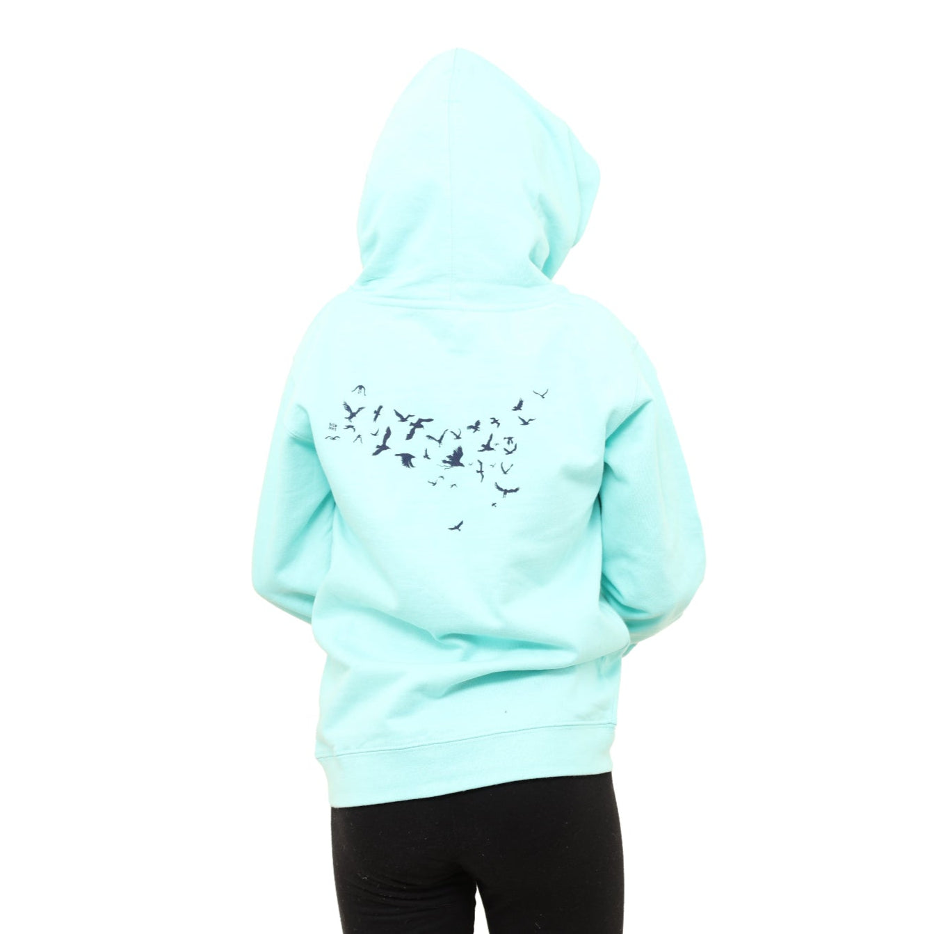 girl with back turned, hood up, with birds on the back