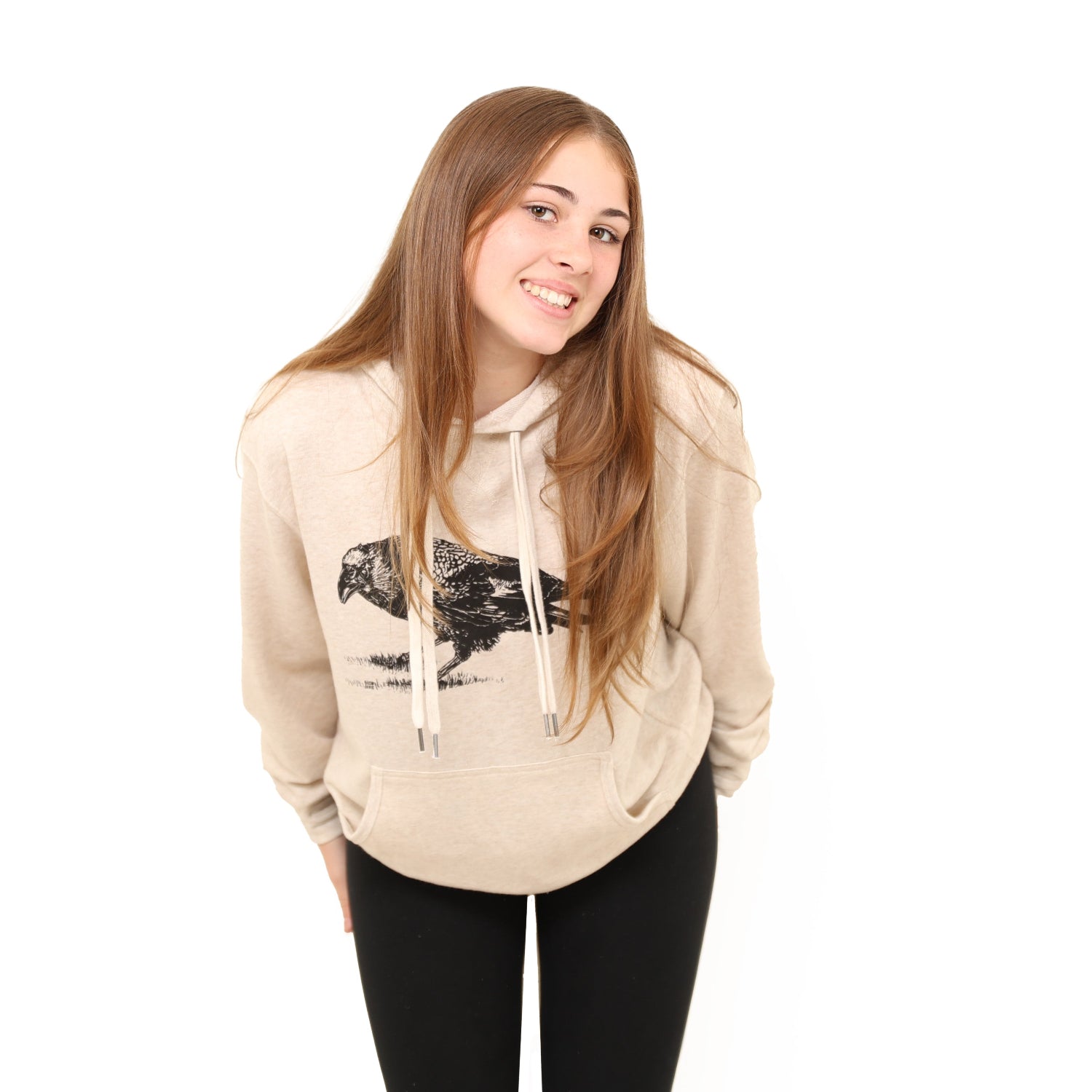Girl standing in white background wearing slow loris crow pullover hoodie