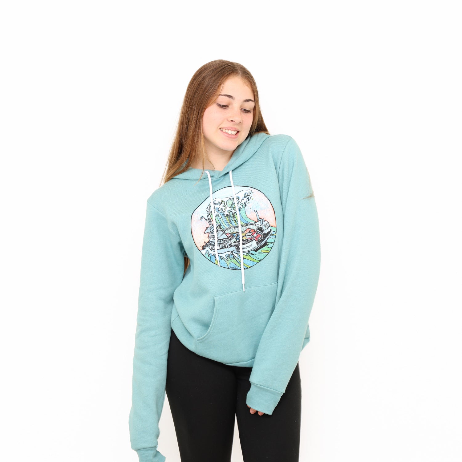 Girl standing in a white background wearing a slow loris unisex tsunami pullover hoodie
