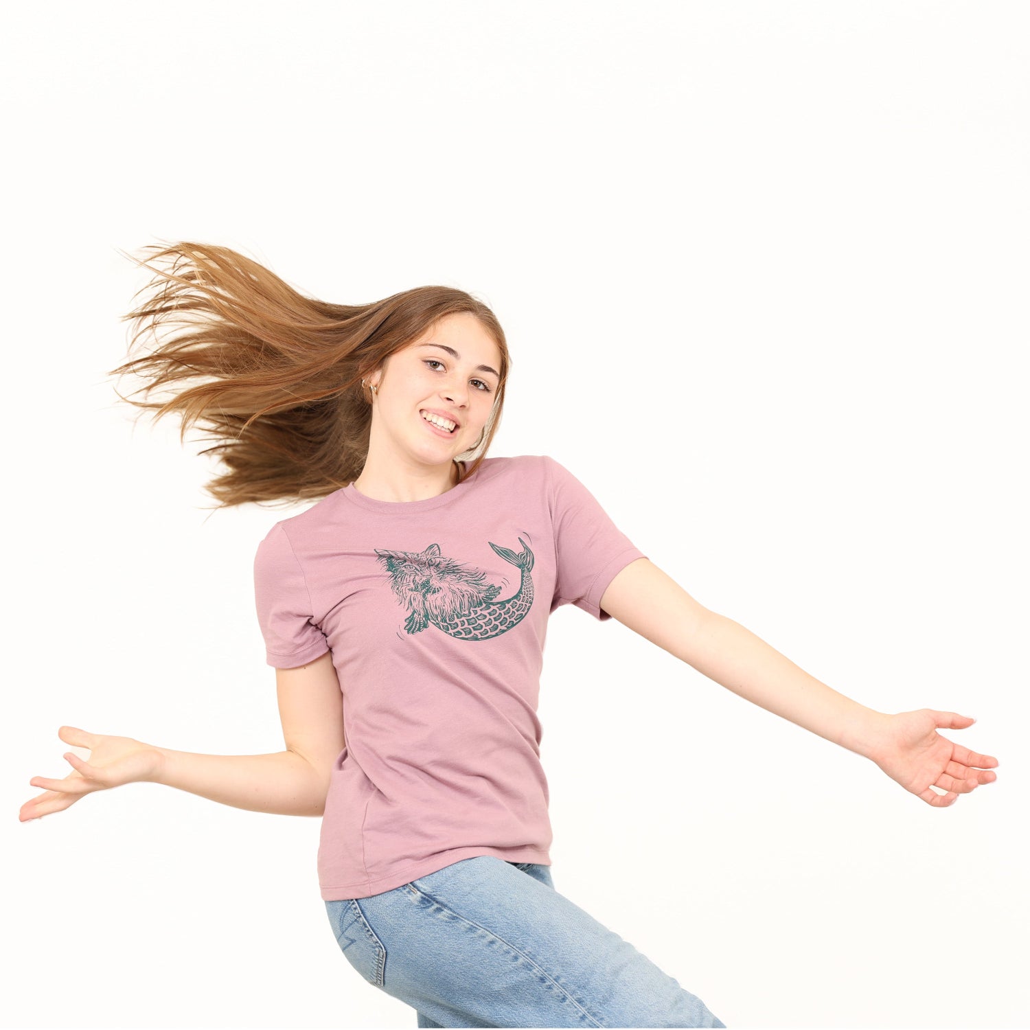 girl with hair and arms out with white backdrop
