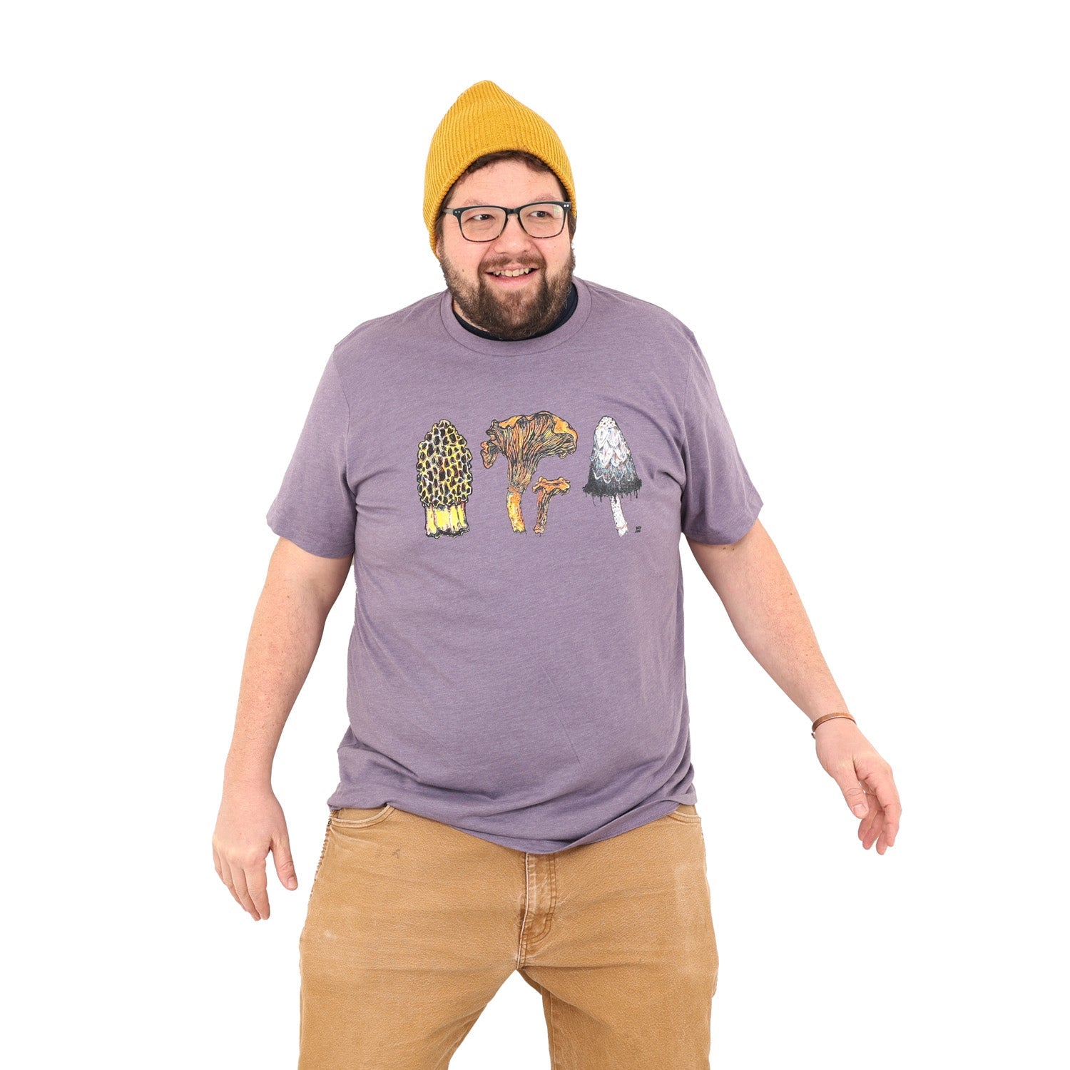 man wearing a light purple colored shirt with three mushrooms- morel, chantrelle, and shaggy mane