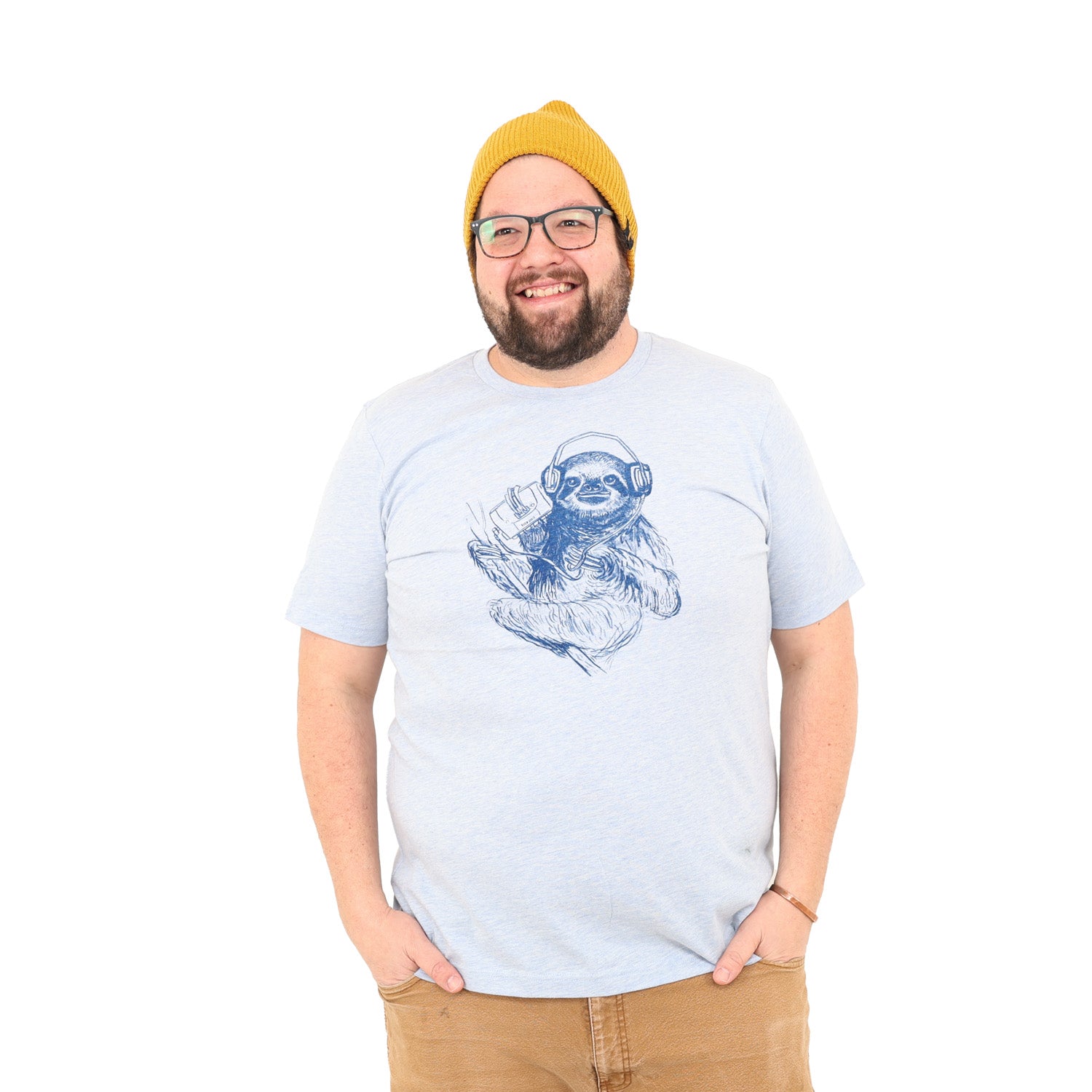 light blue shirt with dark blue screen print of a sloth listening to music on headphones.