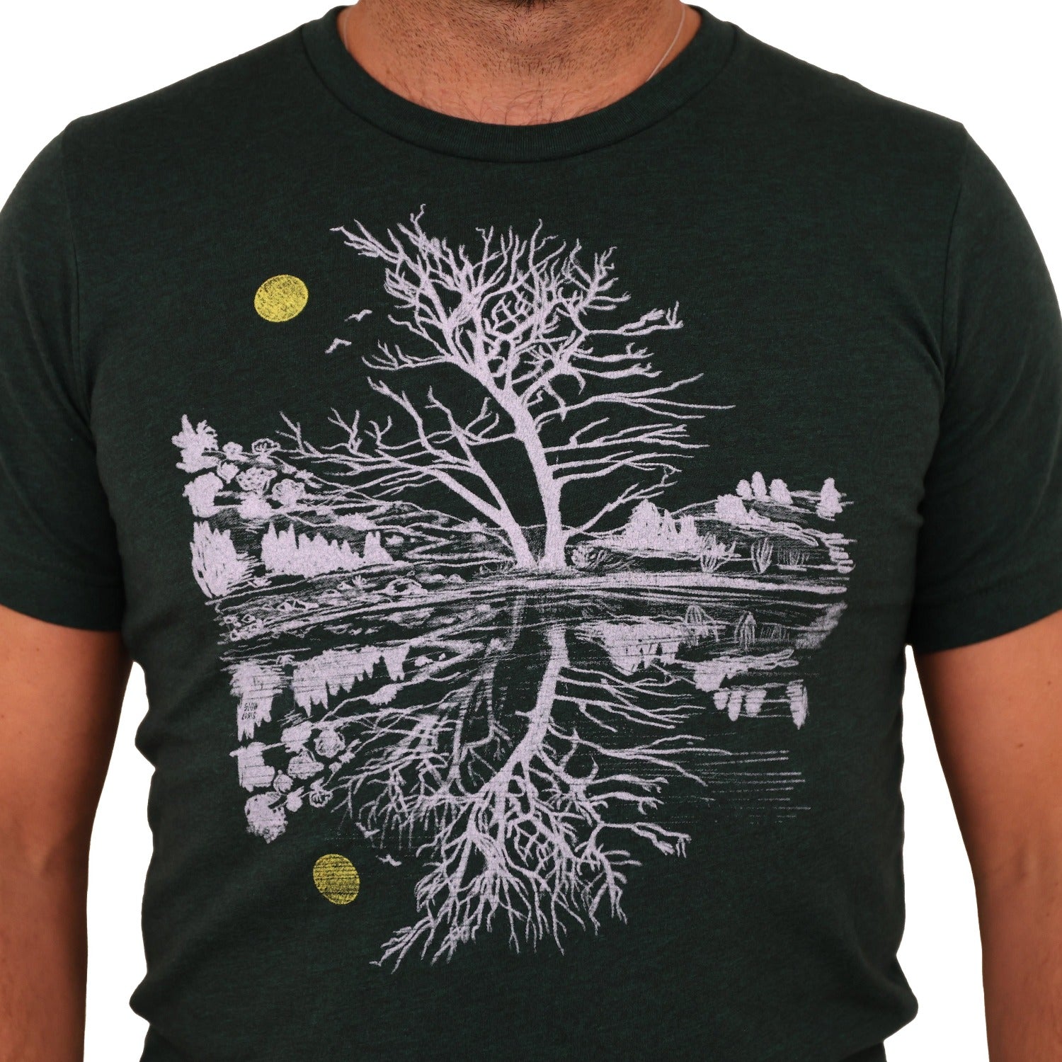 green t-shirt and light ink and a yellow moon with scene reflecting over water.