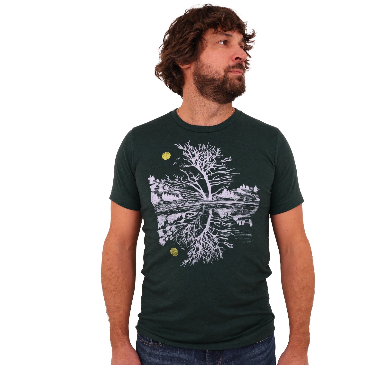 green t-shirt and light ink and a yellow moon with scene reflecting over water.