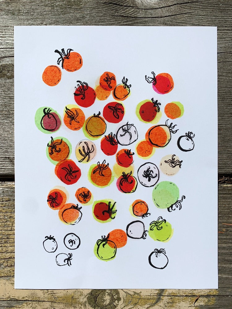 Art print of colorful cherry tomatoes against a white background, lying on a wooden table.