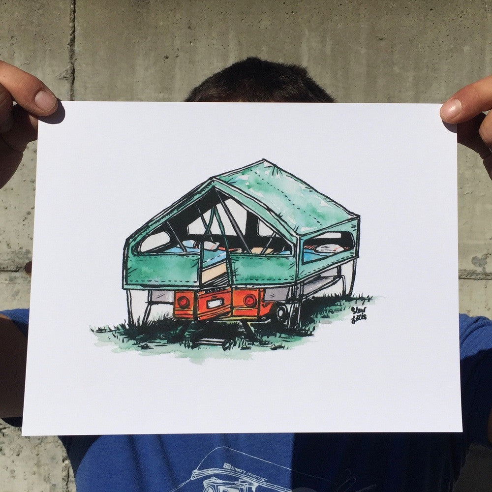 Art print painting of green and orange canvas tent camper trailer in grass, held at corners in pinched fingers.