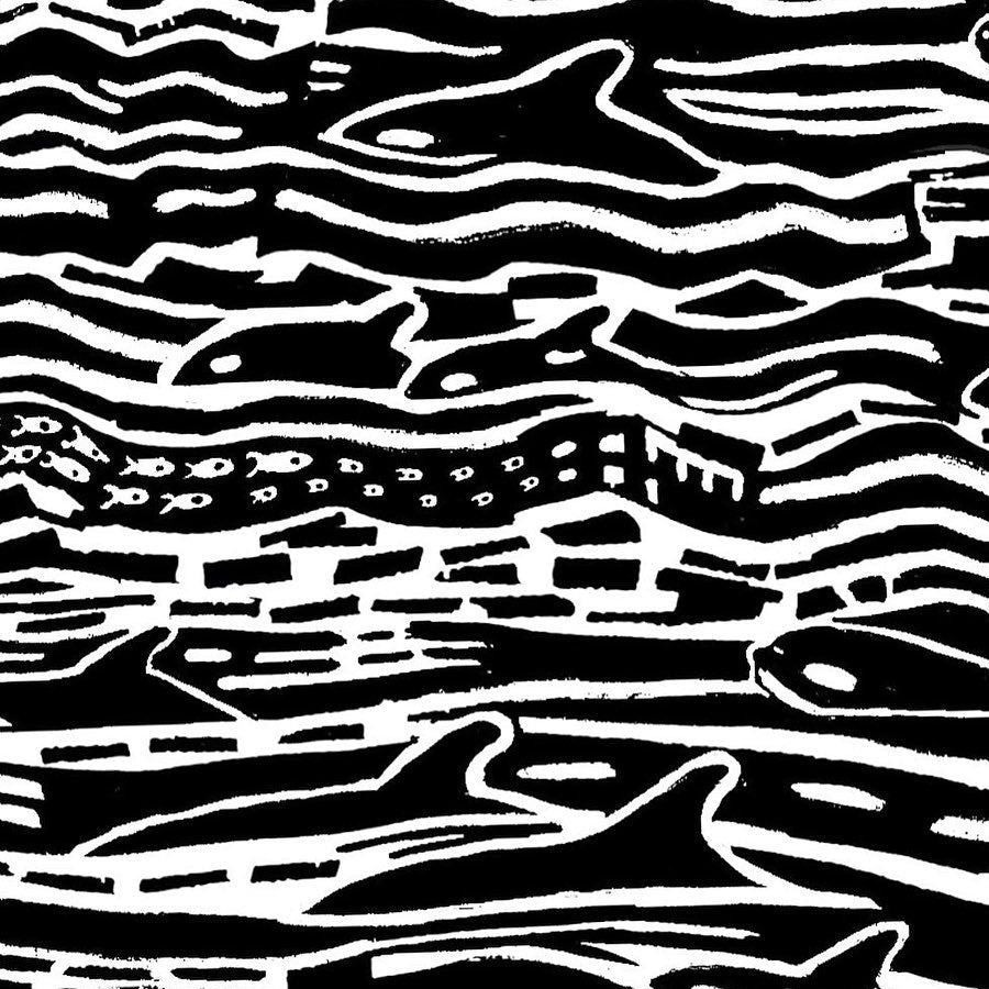 Closup of black ink print of tiny fish details.