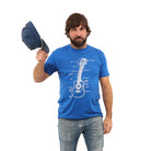 man holding ball cap with a white background. Man is wearing blue t-shirt with a guitar on it with labeled parts.