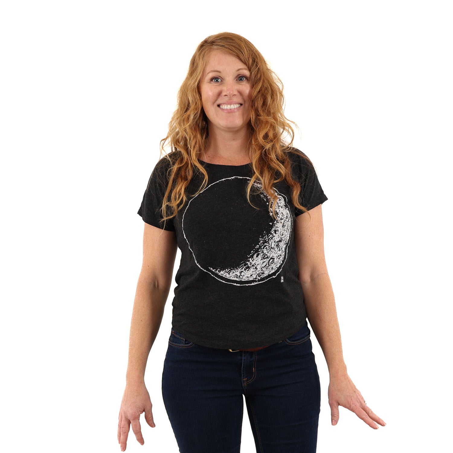 Woman wearing a black t shirt with crescent moon printed in white ink