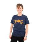 gril smiling wearing blue t-shirt with crab screen printed on it. 
