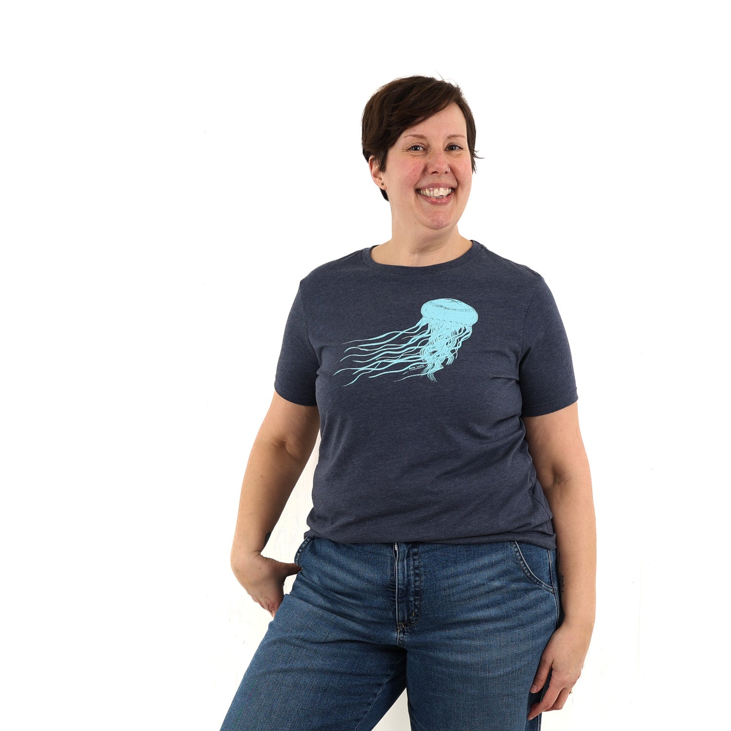 woman wearing blue t shirt with light blue jellyfish print. 