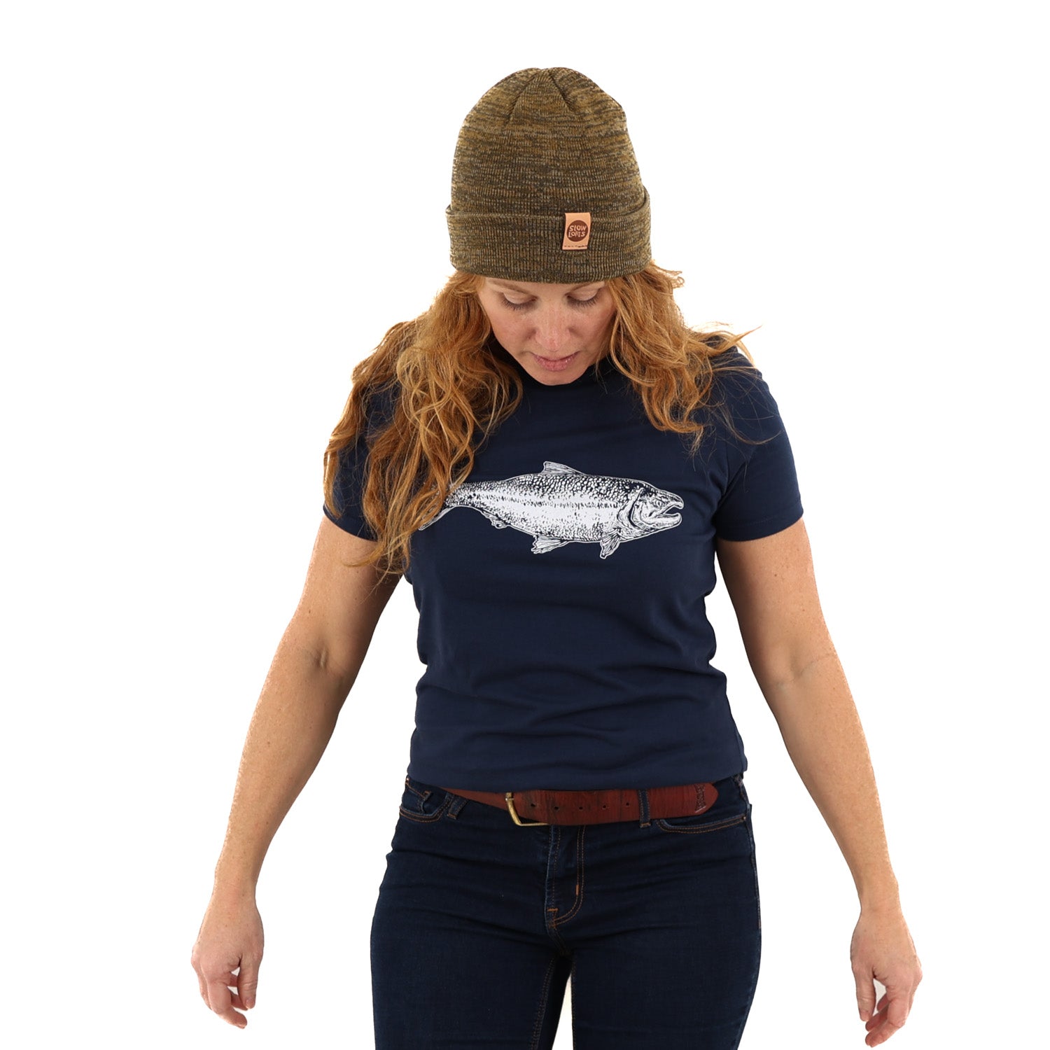Woman wearing fitted navy blue t shirt with a salmon printed in white ink 