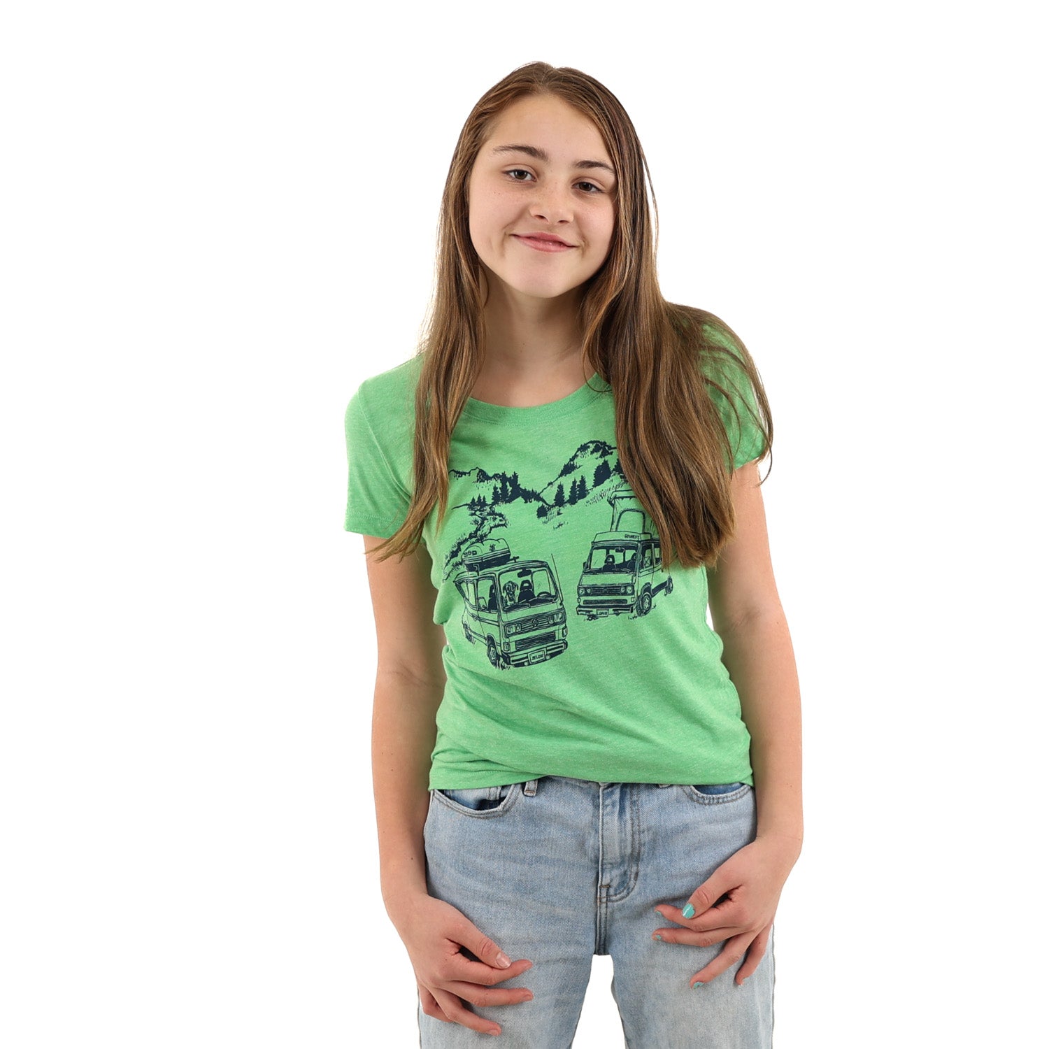 Young girl wearing green t shirt with westfalia scene in blue ink.