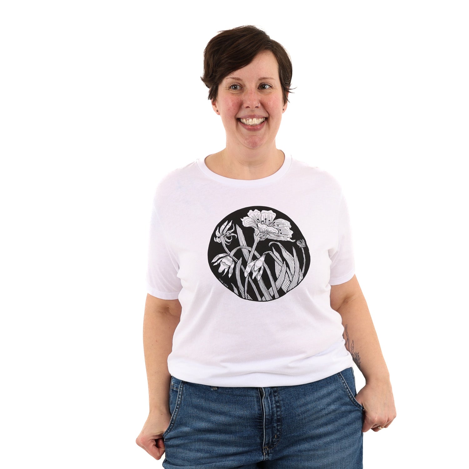 woman wearing white t shirt with black ink of an evening star t shirt.
