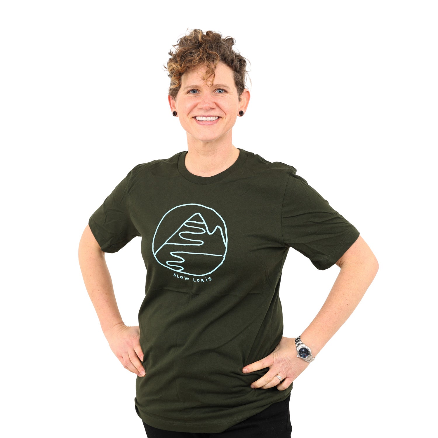 Woman wearing dark green t-shirt with light blue ink of the Slow Loris mountain hug design.