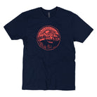 dark blue shirt with an orange print of sunsetting behind the mountains, and a canoe lake scene.