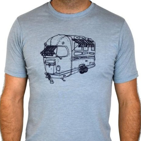 Blue t shirt with airstream trailer design on man with jeans.