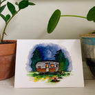 Greeting card printed with a colorful painting of an Orbit camper on a starry night, one of six designs in a set.
