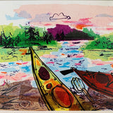 Close-up detail of a greeting card featuring a colorful tissue and ink painting of kayaks on a beach.