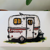 A greeting card printed with a colorful painting of a vintage Scamp trailer camper.