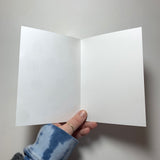 The inside of our Warm Fuzzies greeting card, which is blank.