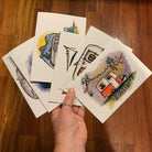 Set of six greeting cards, each printed with a different colorful painting of a vintage camper trailer.