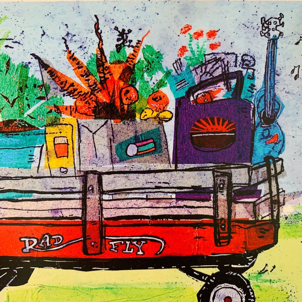 Detail of our greeting card printed with a colorful painting of a wagon full of groceries - bags  overflowing with fruits and vegetables and flowers.