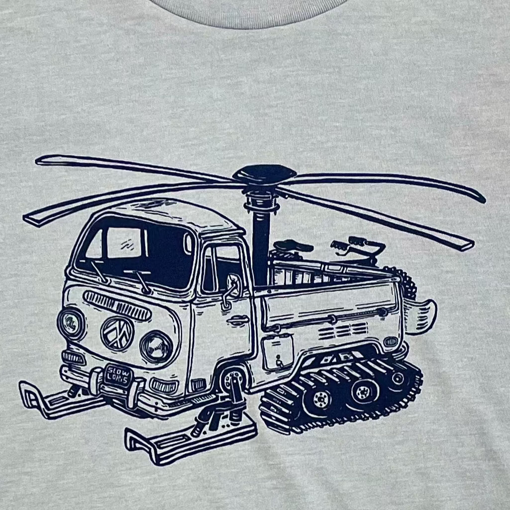 shirt with the helicopter van with tracks and skis on it.
