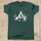 green t-shirt with a white print of a multitool. The tools within the multitool are actually adventuring items- kayak, fishing pole, skis, ice axe, etc etc.
